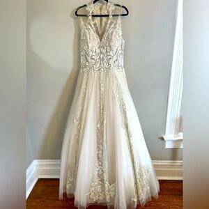 Elegant Ivory & Champagne Wedding Dress with Beautiful Sparkling Detail